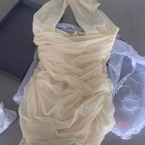 House of CB MISTRESS ROCKS OVER IT LEMON HALTER MINI DRESS